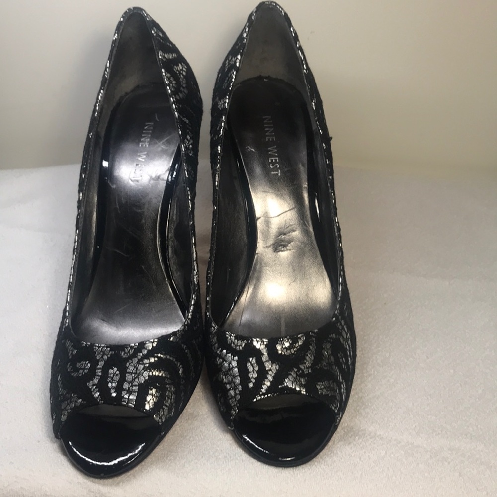 Nine West black and silver open toe pumps.